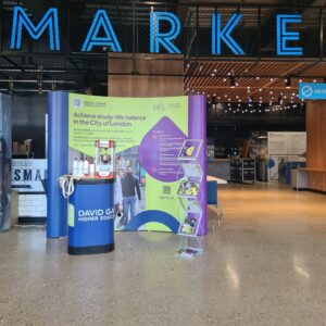 University stall, with banner and stand